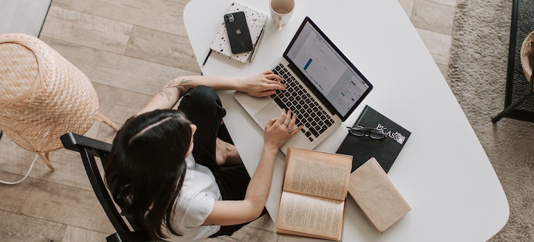 Woman looking for a moving company online