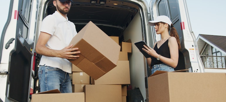 Man and woman checking inventory.